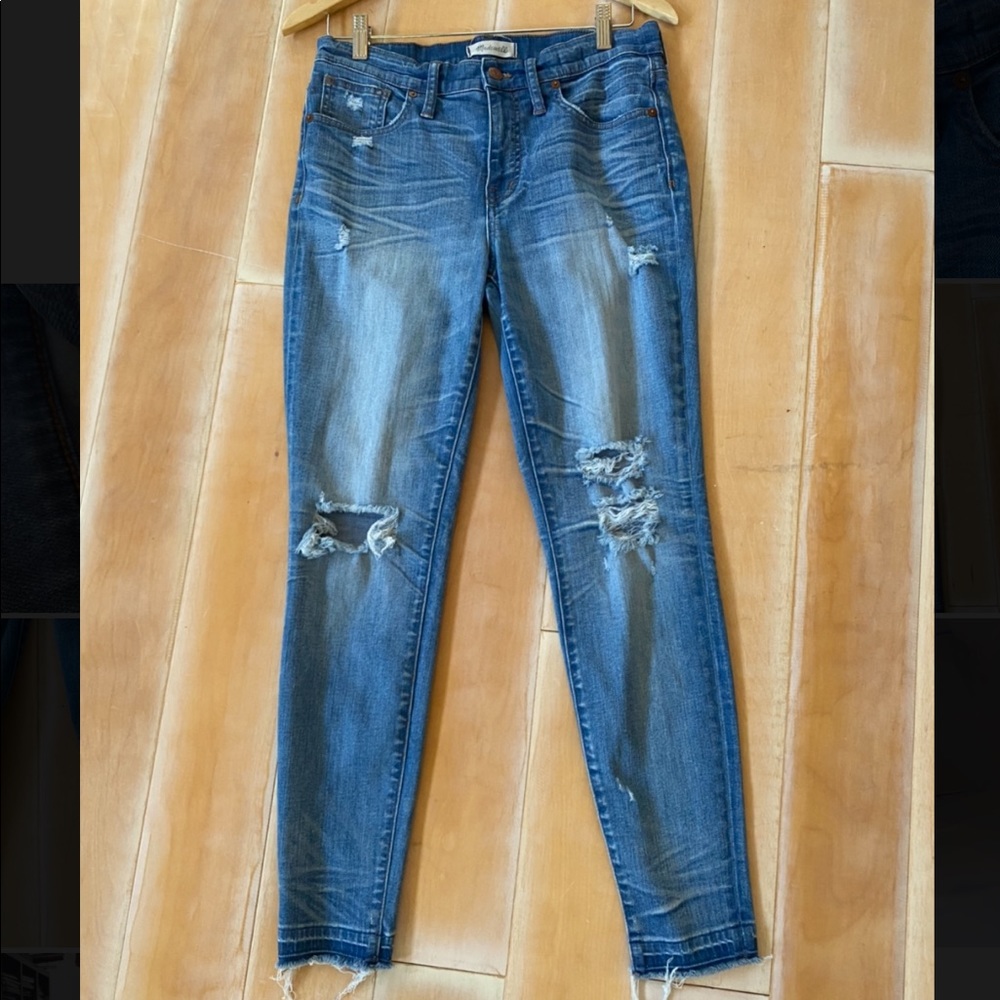 Madewell Skinny distressed jean. Fit great.Perfect amount of stretch. Frayed hem